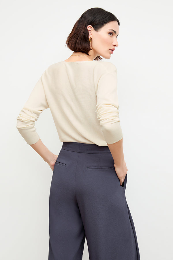 back image of a woman wearing the monica top in cream | Exclude | Grid Hover