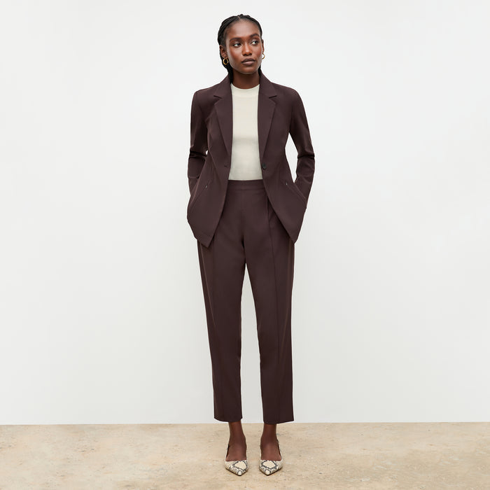 front image of a woman wearing the moreland jacket in wine | Lead