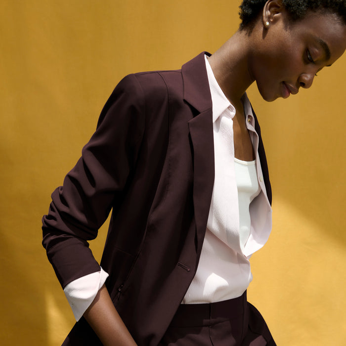 image of a woman wearing the moreland jacket in wine