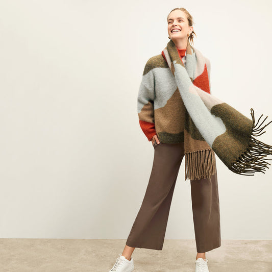 front image of a woman wearing the nash scarf in multi | Lead