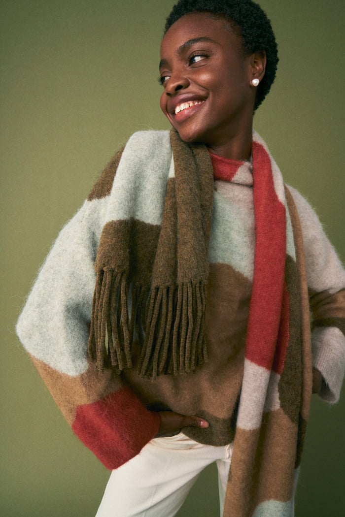 front image of a woman wearing the nash scarf | Exclude | ALT GRID