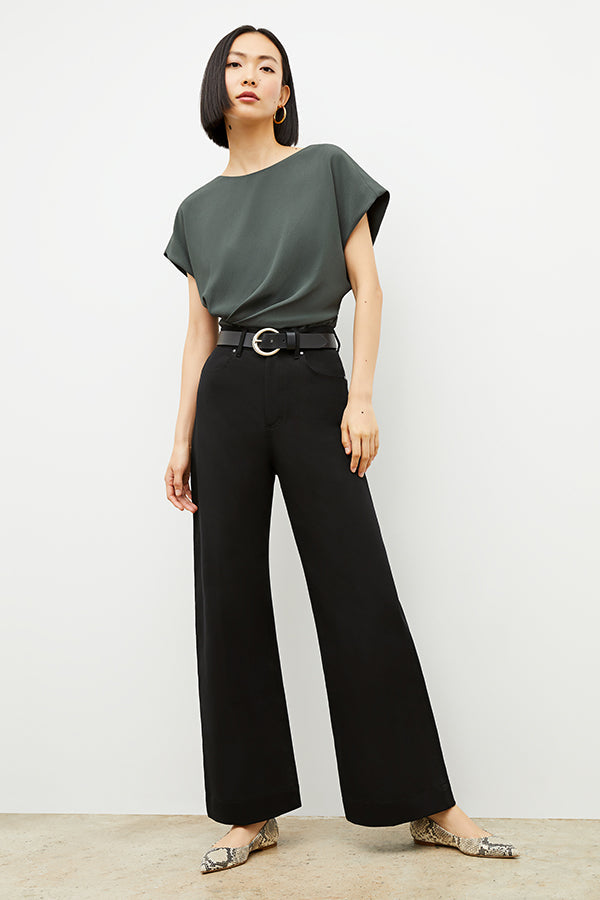 Front image of a woman wearing the Nejvi Top in Aloe | Grid Hover | Exclude