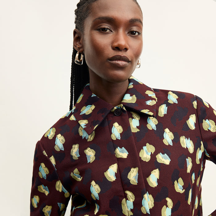 front image of a woman wearing the nicky jacket in bengal jacquard