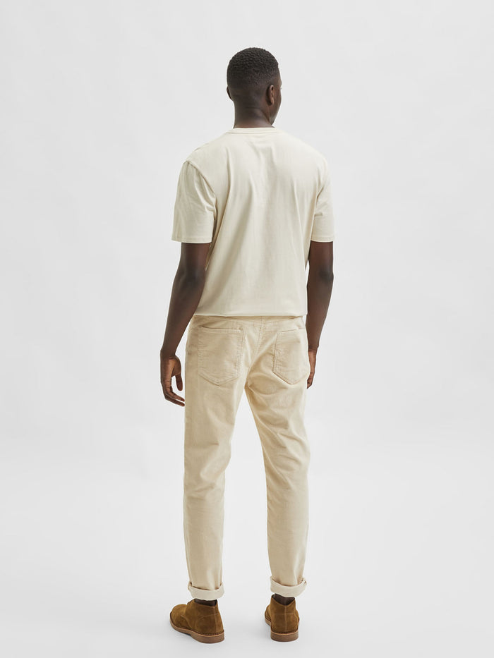 Off-White Mid Rise Slim Jeans