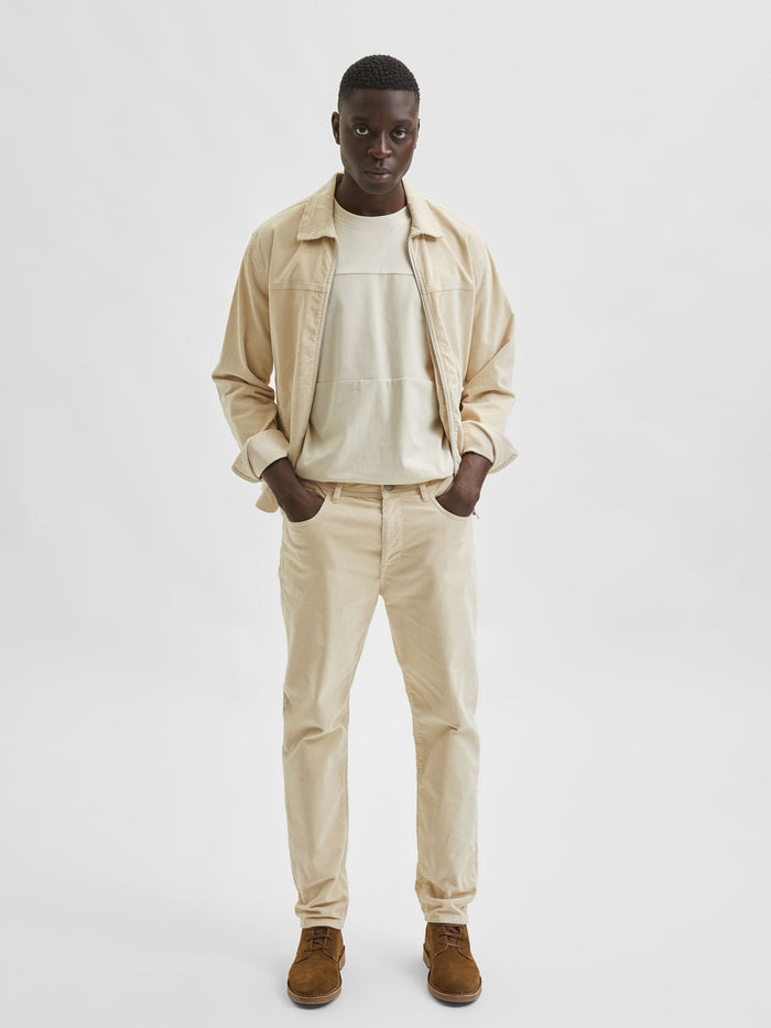 Off-White Mid Rise Slim Jeans