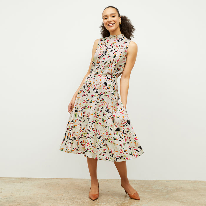 front image of a woman wearing the oona dress in rhythm print | Lead