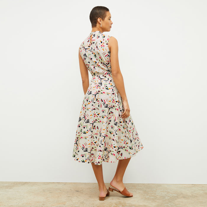 back image of a woman wearing the oona dress in rhythm print