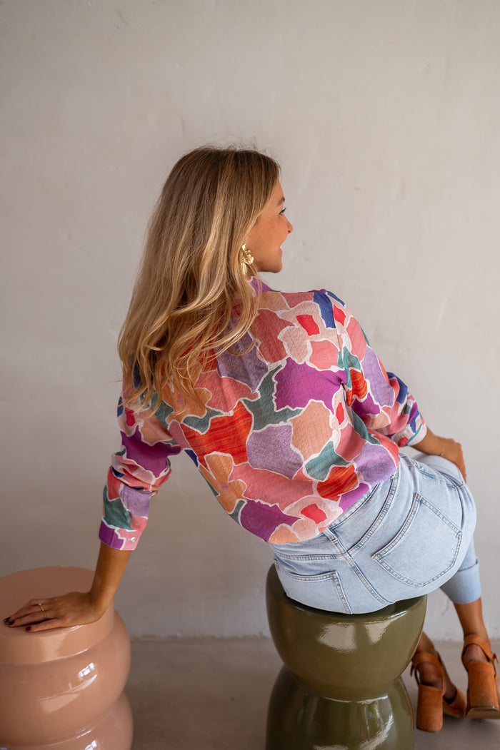 Model wearing patterned Hadri shirt