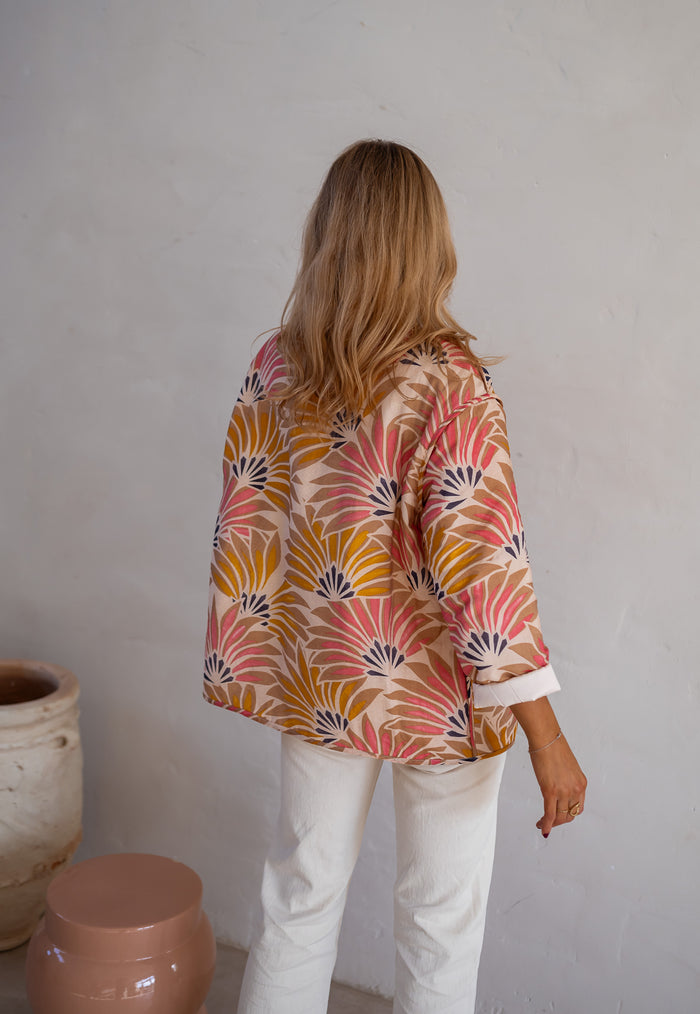 Pink and orange fan-floral jacket, three quarter view
