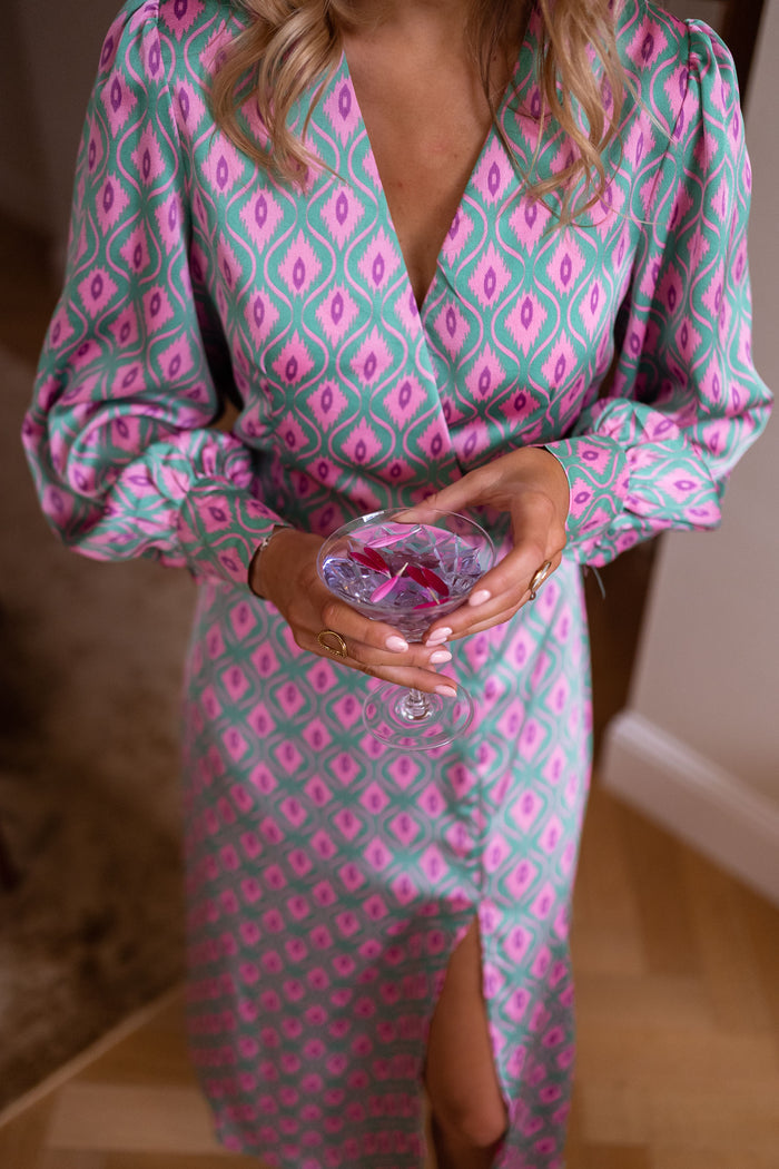Patterned Siam maxi dress showing wrap front and side split