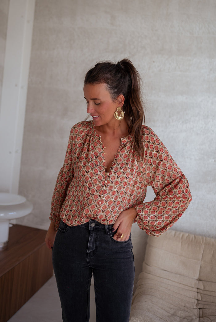 Patterned Tiffany blouse showing print and V-neck
