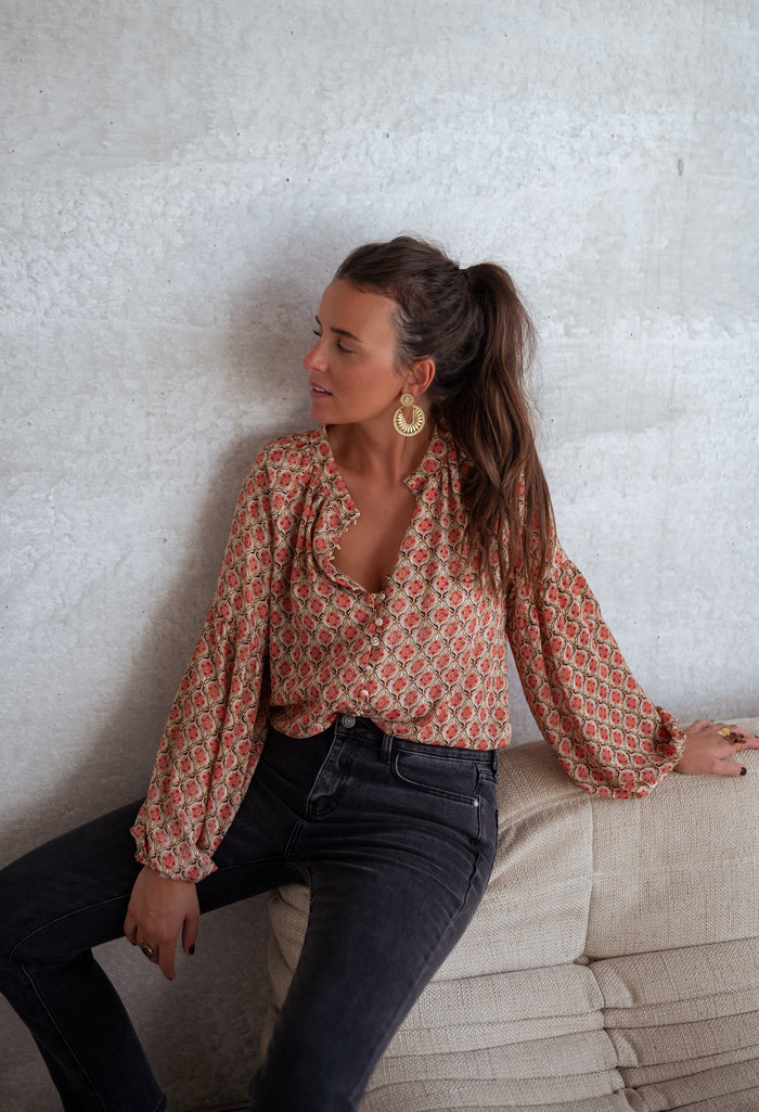 Patterned Tiffany blouse fabric print close-up