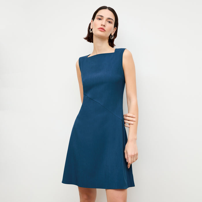 front image of a woman wearing the pauline dress in deep teal | Lead