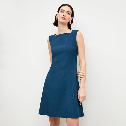 front image of a woman wearing the pauline dress in deep teal | Lead