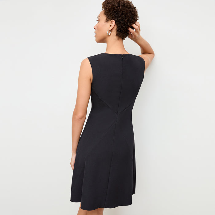 back image of a woman wearing the pauline dress in black
