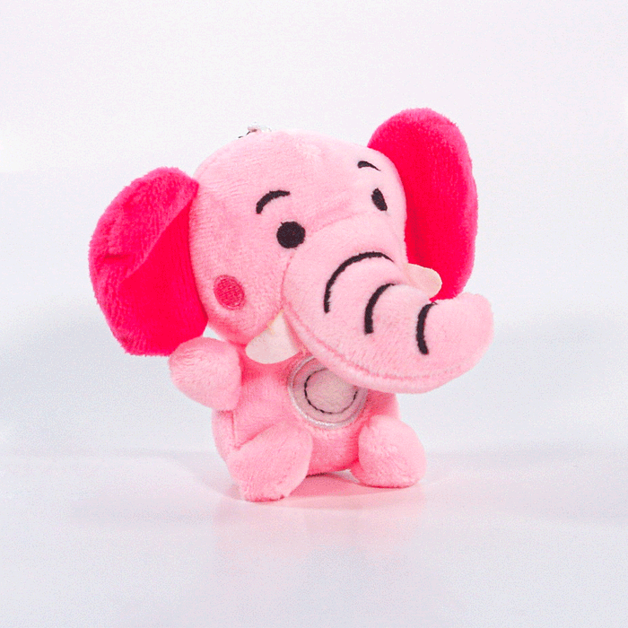 The Pink Elefants plush toy is a cute pink elephant with large floppy ears, a smiling face, and stitched details, displayed against a plain white background.