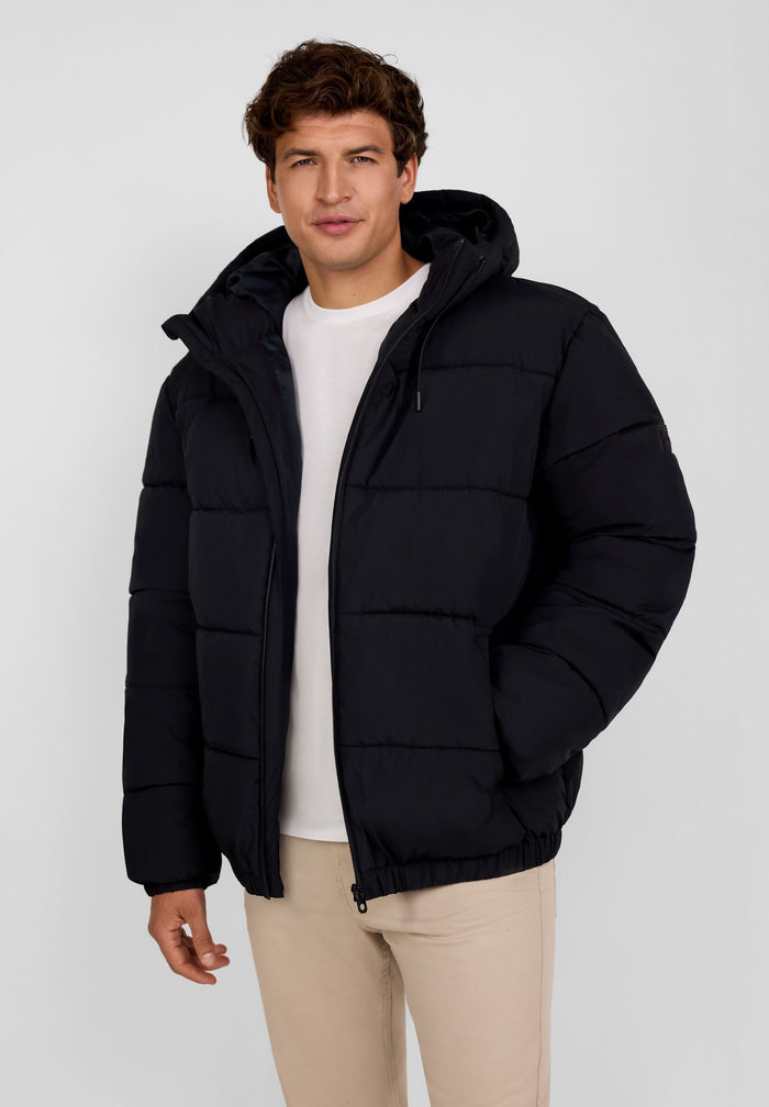 Men's black ripstop jacket with high collar and elastic cuffs, front view.