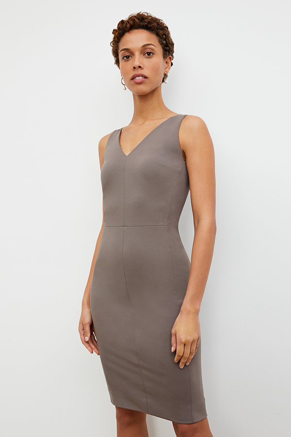 Front image of a woman wearing the Rachel dress in Pebble | Exclude | Grid
