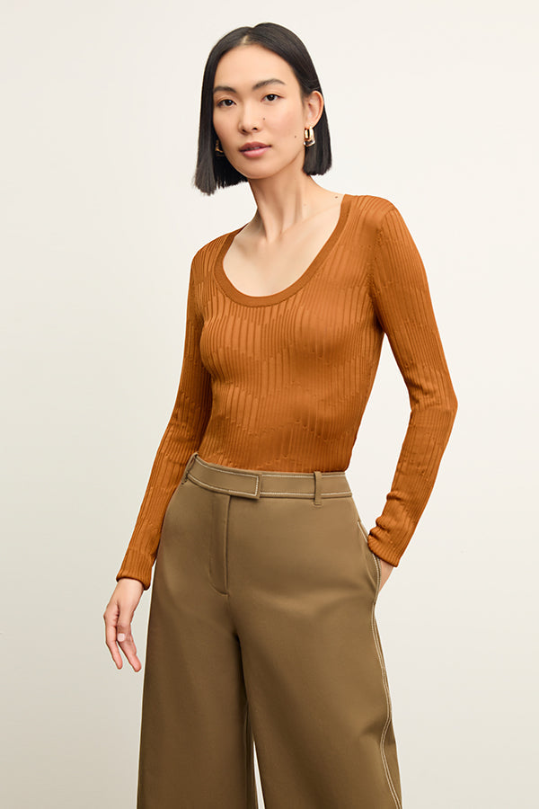 front image of a woman wearing the rae top in caramel | Exclude | Grid