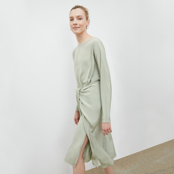 Front image of a woman wearing the Rashmeen dress in Minty Green