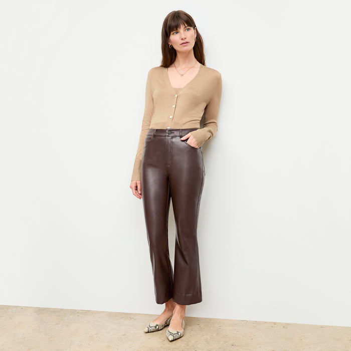 front image of a woman wearing the delphine top in camel