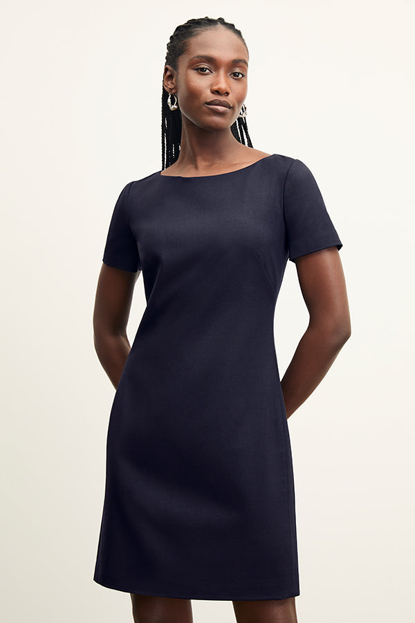 front image of a woman wearing the rosie dress in galaxy blue | Exclude | Grid | Still