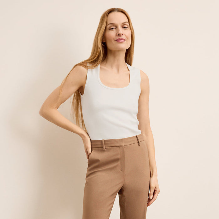 front image of a woman wearing the sabine top in ivory  | Lead