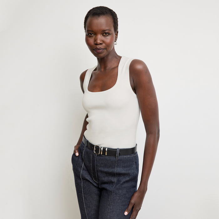 front image of a woman wearing the sabine top in ivory | Lead