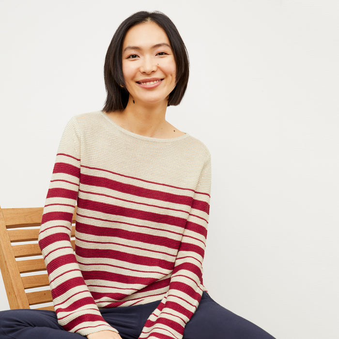Image of a woman wearing the Samara Sweater in Crimson / Ivory | Lead