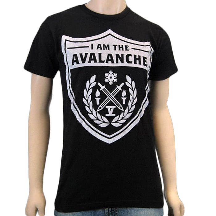 A person wears a black I Am The Avalanche T-shirt featuring a large white shield with I AM THE AVALANCHE above crossed torches, a snowflake, laurel branches, and the Roman numeral V.