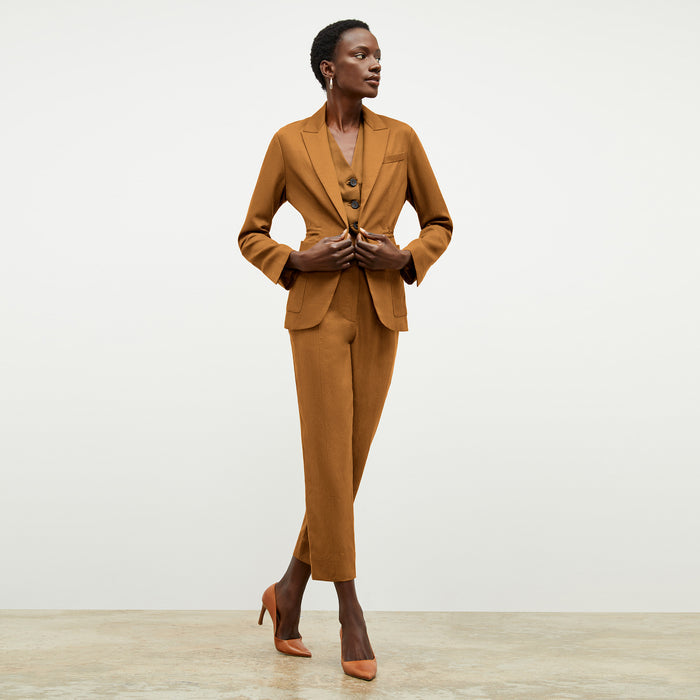 Front image of a woman wearing the Shane Pant in Acorn