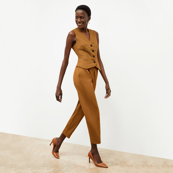 Front image of a woman wearing the Shane Pant in Acorn