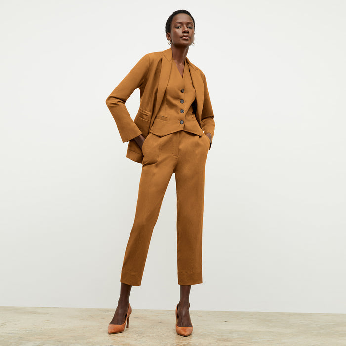 Front image of a woman wearing the Shane Pant in Acorn