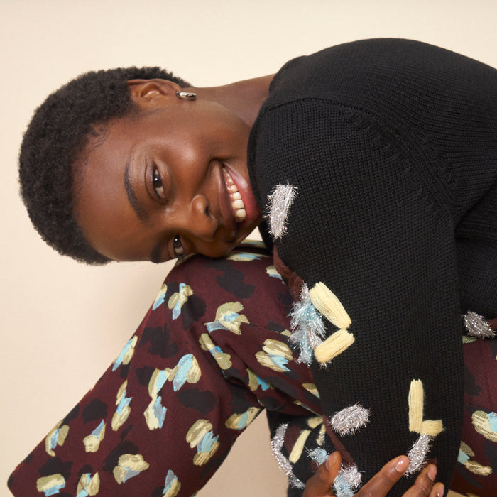 side mood image of a woman wearing the smith pant in bengal jacquard