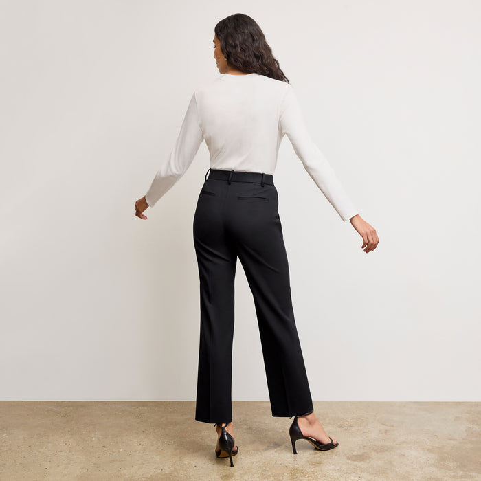 back image of a woman wearing the smith pant in galaxy blue