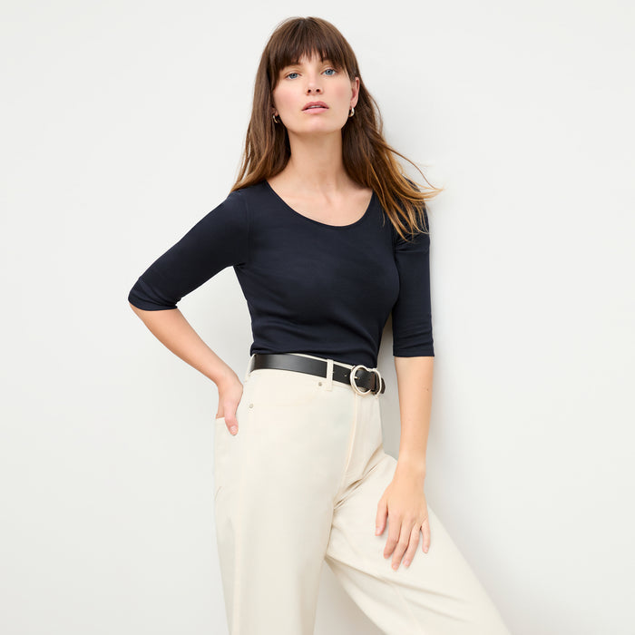 front image of a woman wearing the soyoung t-shirt in galaxy blue | Lead