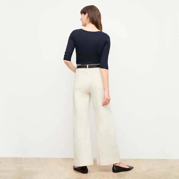 back image of a woman wearing the soyoung t-shirt in galaxy blue