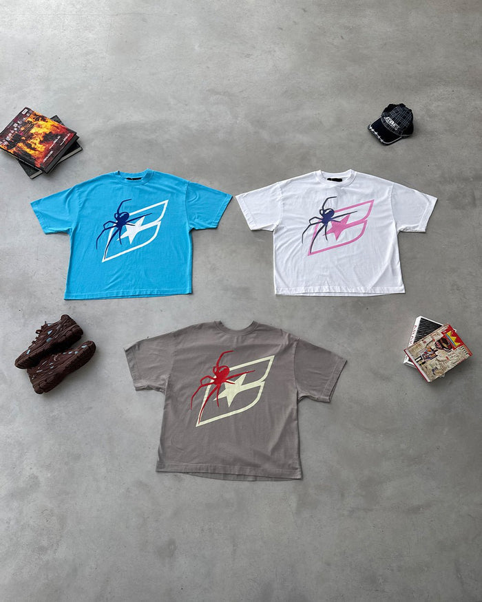 SPIDER TEE BLUE - blue graphic print tee, flat lay with matching pieces - Cold Culture