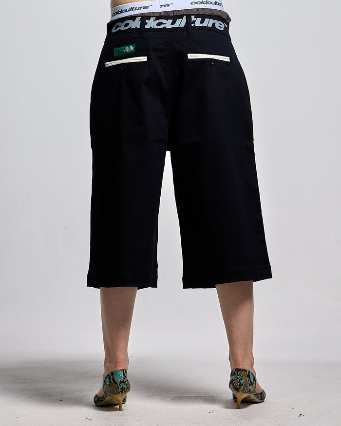 SUIT JORTS DARK BLUE - dark navy tailored shorts, back view on female model - Cold Culture #woman