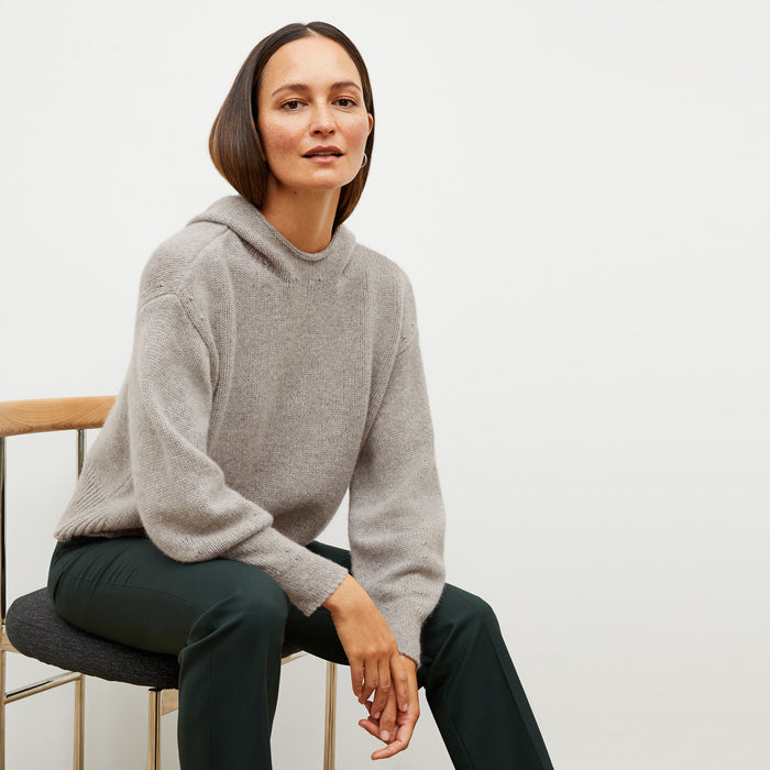 Front image of a woman wearing the thomas sweater in stormcloud