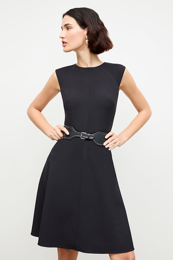 front image of a woman wearing the toi dress in black | Exclude | Grid