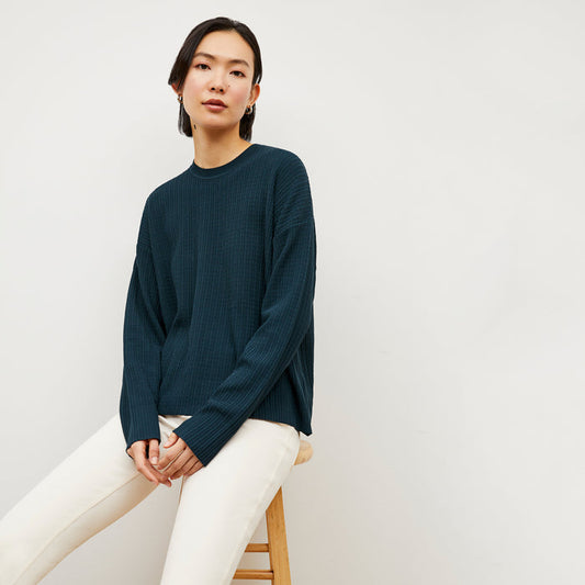 Front image of a woman wearing the Tyler Sweatshirt - Geo Micro Knit in Deep Sea | Lead
