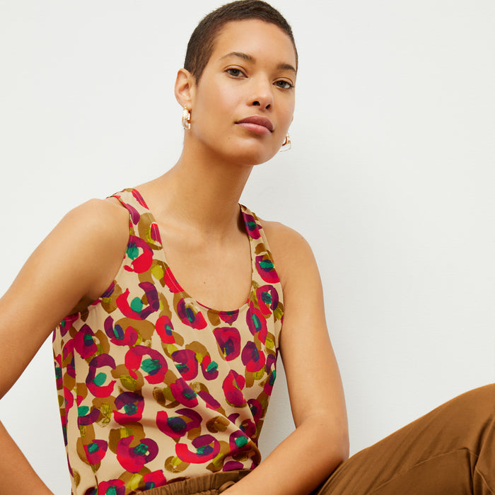 Front image of a woman wearing the Vicky Tank in Peacock Print