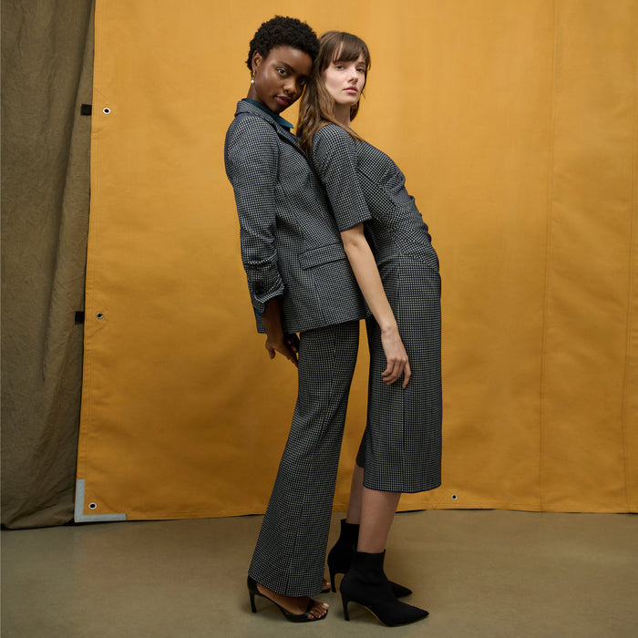 side image of a woman wearing the yiyan jacket in stretch houndstooth